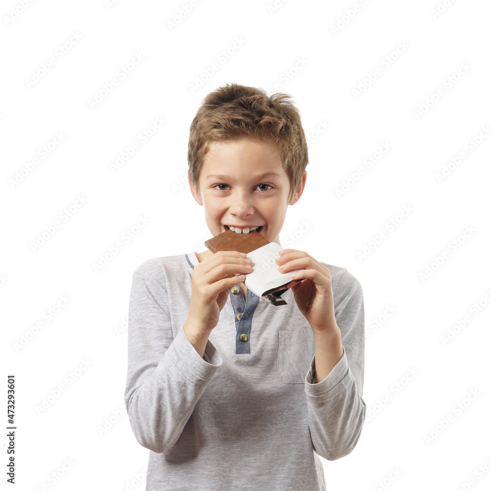 happy child with chocolate bar isolated on white happy child with chocolate bar isolated on white