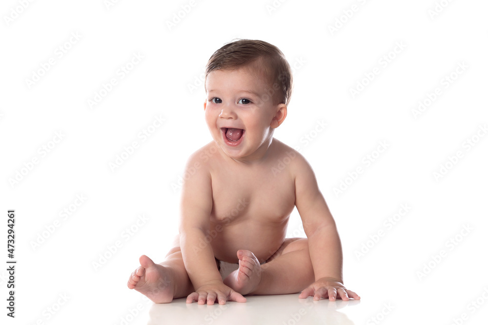 Healthy baby boy sitting on a white isolated Healthy baby boy sitting on a white isolated