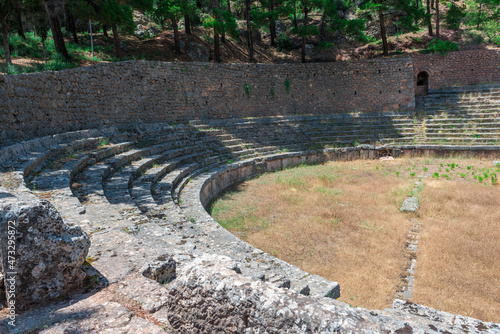 The ancient greek theater of Delphi in the archaeological site in Delphi, Fokida, Greece photo