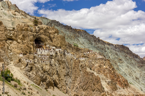 The ancient Tibetan Buddhist Phuktal monastery of on a steep rocky hillside in the Zanskar region in Ladakh in the Indian himalaya.