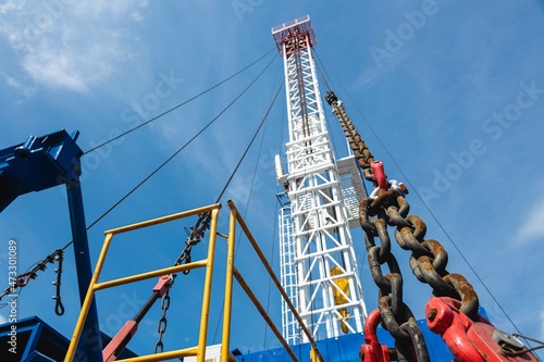 Mobile drilling rig close-up. Drilling and servicing oil and gas wells photo