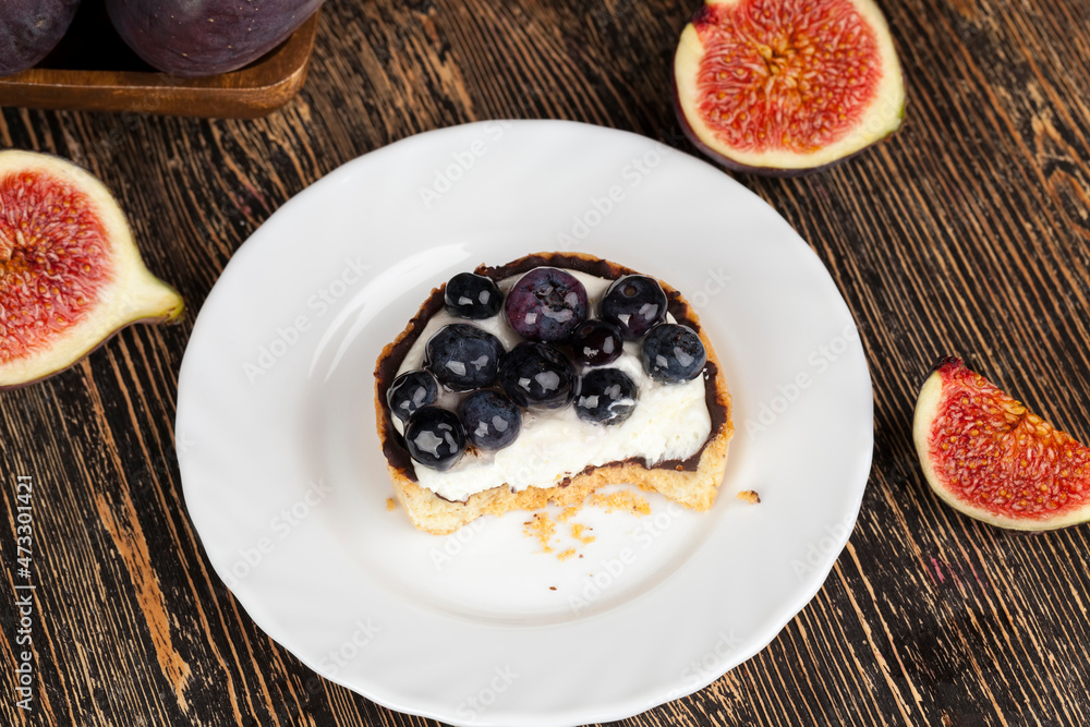 tartlet with cream and blueberries tartlet with cream and blueberries