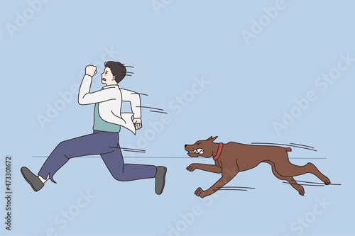 Feeling scared and afraid of dogs concept. Young stressed afraid man running from brown dog outdoors feeling scared and panic vector illustration 