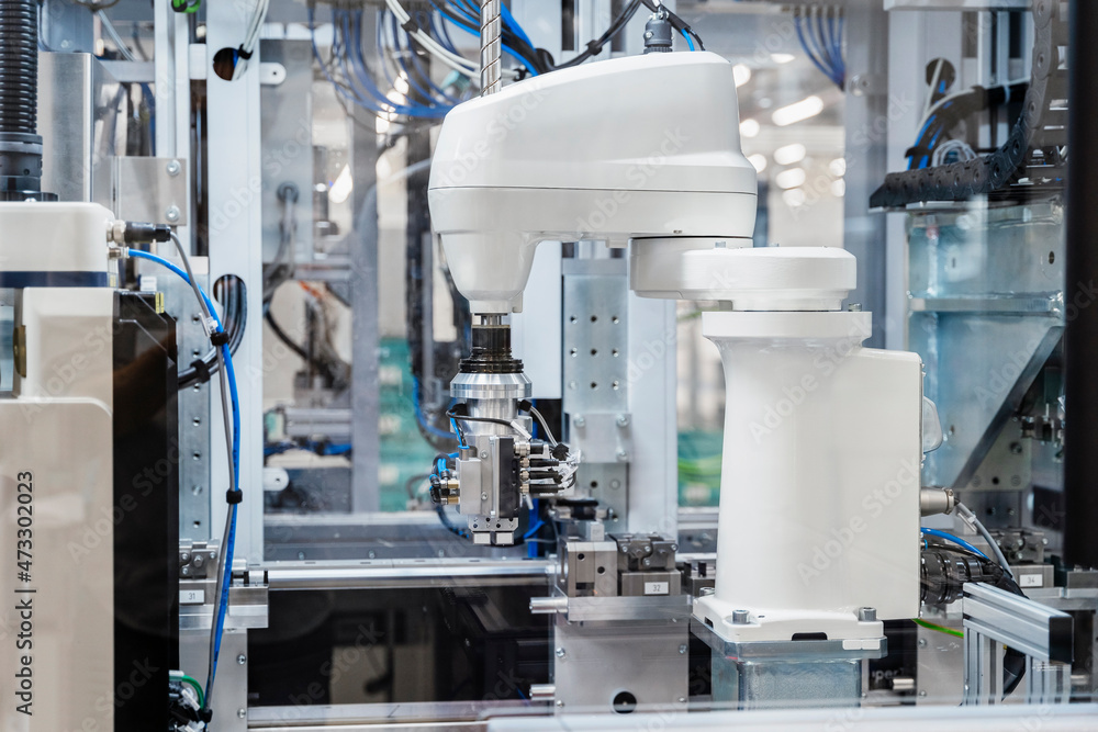 Robotic machine working in factory Robotic machine working in factory