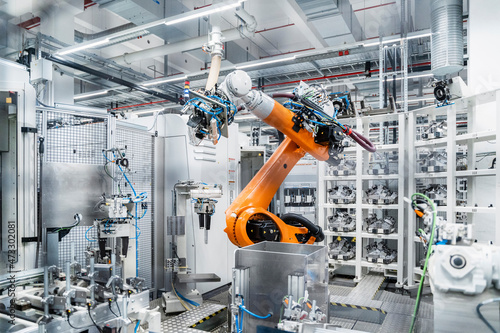 Robotic arm in manufacturing industry photo