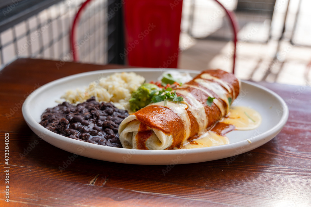 Large Burrito with enchilada Sauce and Beans Large Burrito with enchilada Sauce and Beans