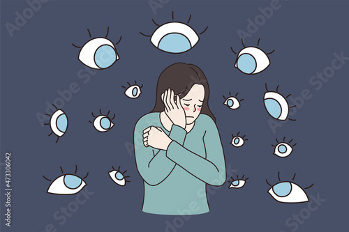 Suffering from evil eyes concept. Sad depressed ashamed girl standing touching her face feeling influence and public attitude and opinion vector illustration 