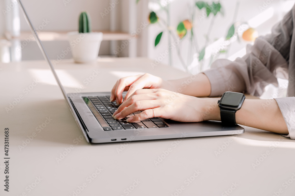 A career woman who works on a laptop. A career woman who works on a laptop.