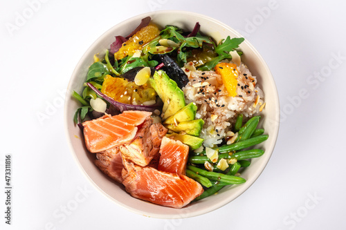 Bowl healthy salad with salmon top view
