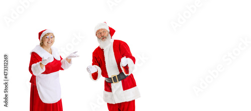Emotional Santa Claus and his wife, missis Claus congratulating with New Year and Christmas, writing a letter, wish list
