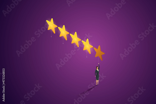 Business woman gives a five-star rating.