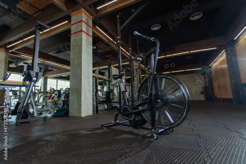 Air bike in the modern gym. Functional training. Gym interior