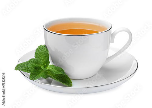 Cup of aromatic green tea with fresh mint on white background
