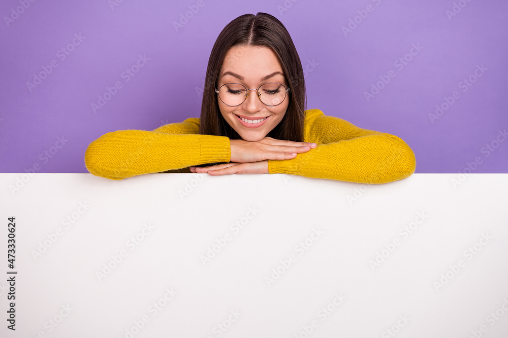 Photo of young pretty cheerful girl look empty space advertise information isolated over purple color background Photo of young pretty cheerful girl look empty space advertise information isolated over purple color background