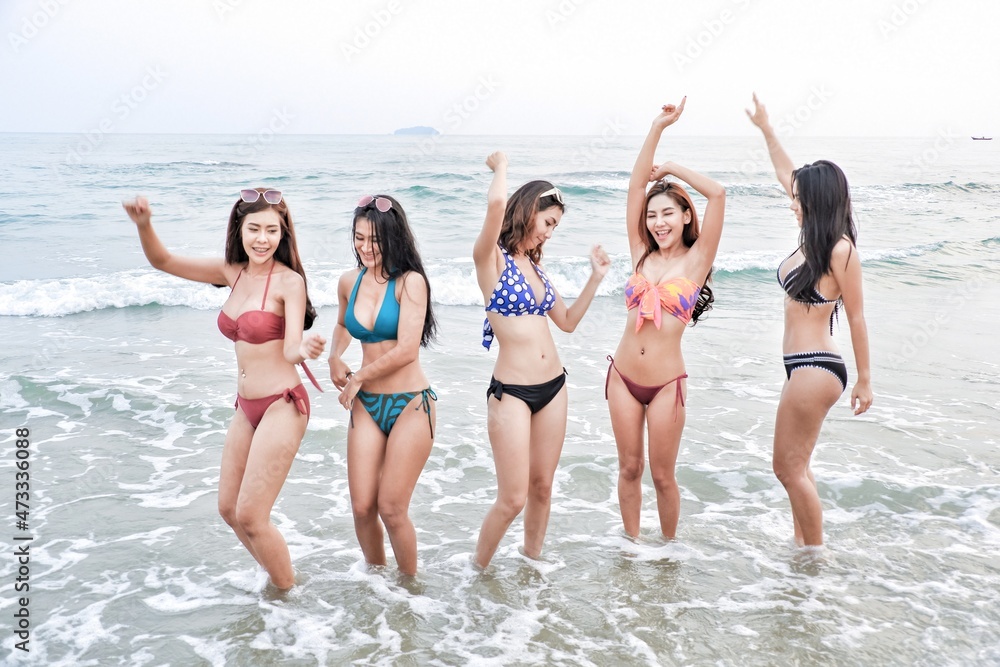 sexy bikini party seaside enjoy meeting group friends having fun dancing on the beach, happy life on summer season