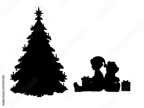 Silhouettes of boy and toy bear with gifts by near the Christmas tree.