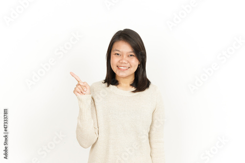 Pointing aside Showing Product of Beautiful Asian Woman Isolated On White Background