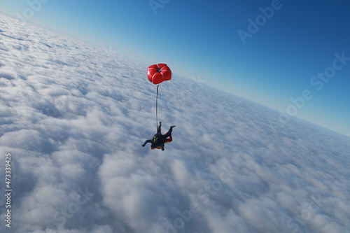 Skydiving. Tandem jump. The flight is in the sky.