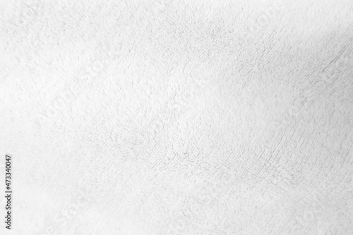 White clean wool texture background. light natural sheep wool. white seamless cotton. texture of fluffy fur for designers. close-up fragment white wool carpet..