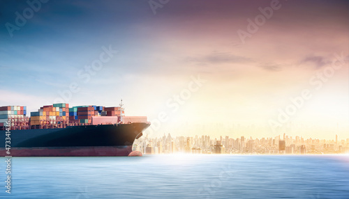 Container cargo ship in the ocean at city background with copy space, Global business logistics import export, Freight transportation, Shipping