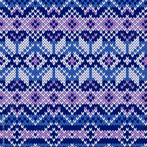 Winter jacquard knitted seamless pattern. Fair isle blue and purple background. Vector illustration.