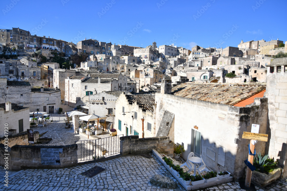 Old houses in a street of Matera, an old city in the Basilicata region, Italy.