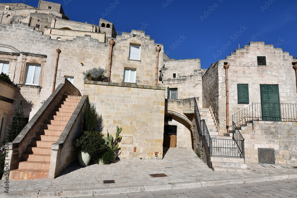 Old houses in a street of Matera, an old city in the Basilicata region, Italy.