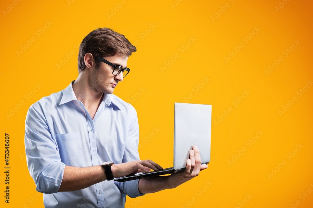 Happy Young Man Showing Laptop Computer Posing Happy Young Man Showing Laptop Computer Posing