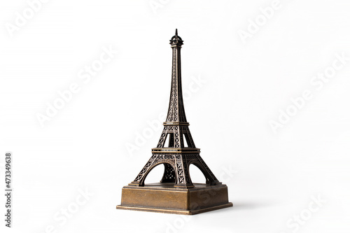Wall Mural Bronze maket of eiffel tower souvenir from Paris white background