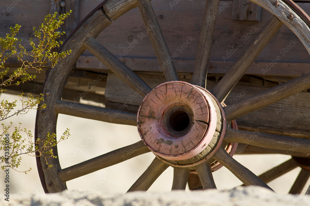 Abandoned Wagon Wheel In The Arizona Desert Abandoned Wagon Wheel In The Arizona Desert