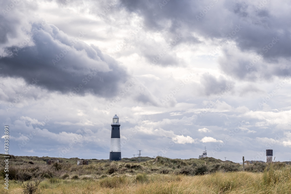 Dramatic sky and lighthouse