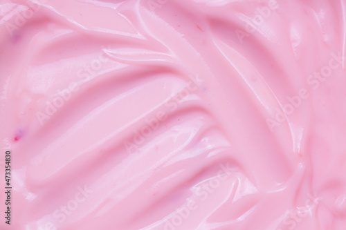 Texture Strawberry Yogurt,Close up the pink creamy homemade blueberries or strawberries yogurt texture background 