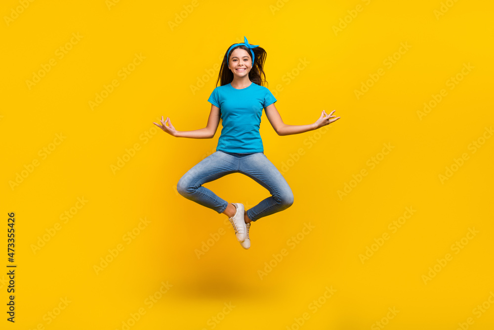 Full length photo of young lady jumper meditate peaceful rest balance isolated over yellow color background