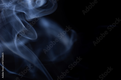 Movement of white smoke isolated on black background.