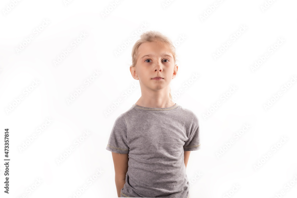 a girl with white hair. he keeps his hands behind his back. no smile. on a white background. close-up. a girl with white hair. he keeps his hands behind his back. no smile. on a white background. close-up.
