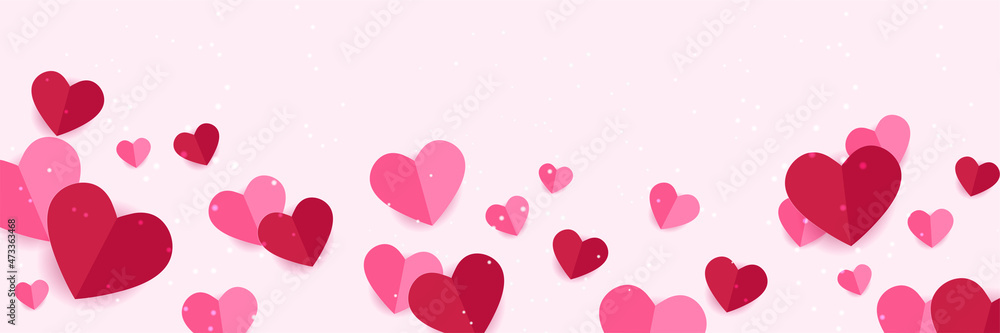 Happy Valentine's Day banner. Holiday background design with big heart made of pink, red Origami Hearts on black fabric background. Horizontal poster, flyer, greeting card, header for website