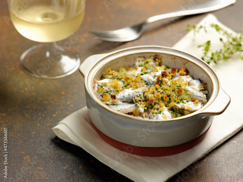 Anchovy gratin in a cocotte photo