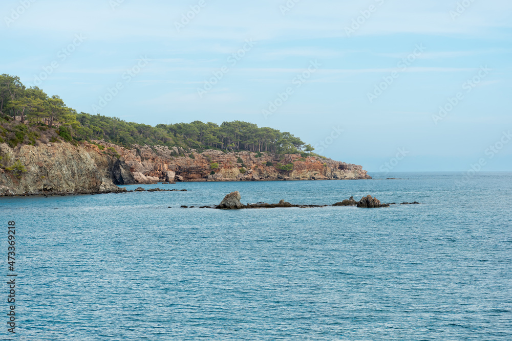 Mediterranean seascape with steep coast and reefs