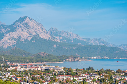view and of the town in a mountain valley (Kemer, Turkey) with Mount Tahtali (Lycian Olympus) in the distance