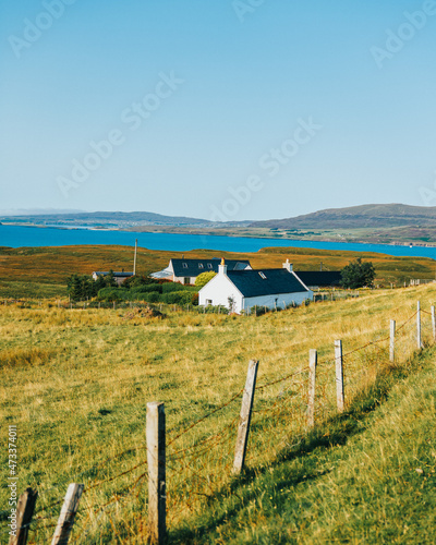 Isolated croft farm house by the bay