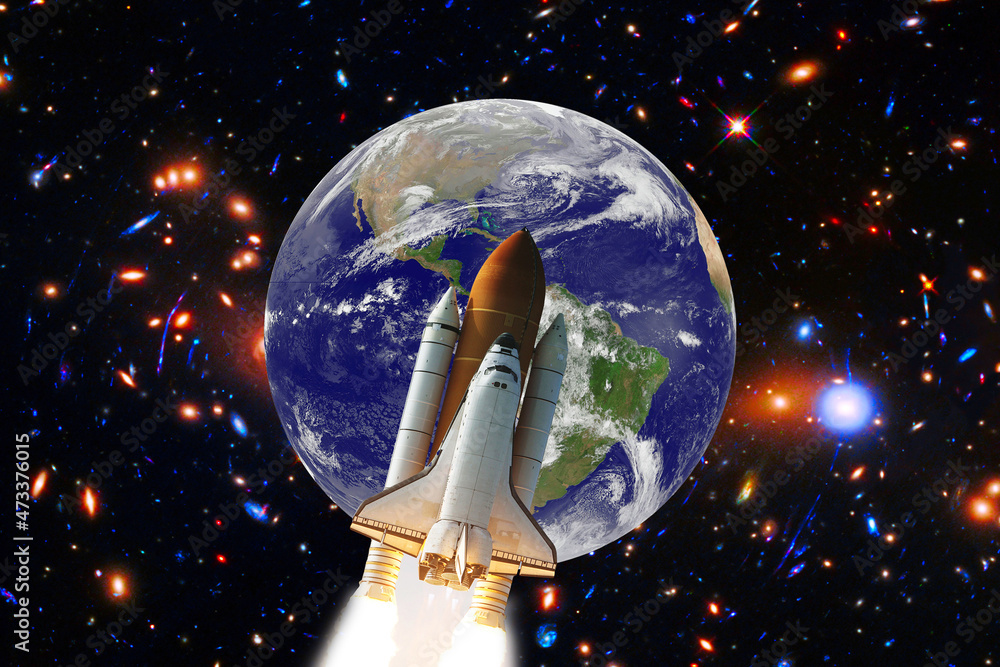 Naklejka premium Earth and rocket in space. The elements of this image furnished by NASA.