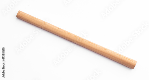 new wooden long stick isolated on white background photo