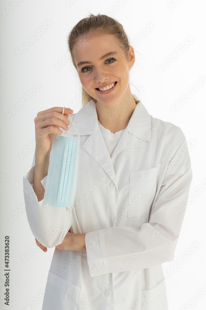 Covid19, coronavirus, healthcare and doctors concept. Portrait of optimistic russian female doctor assure everything be okay, wear medical mask to prevent catching virus, white coat. Covid19, coronavirus, healthcare and doctors concept. Portrait of optimistic russian female doctor assure everything be okay, wear medical mask to prevent catching virus, white coat.