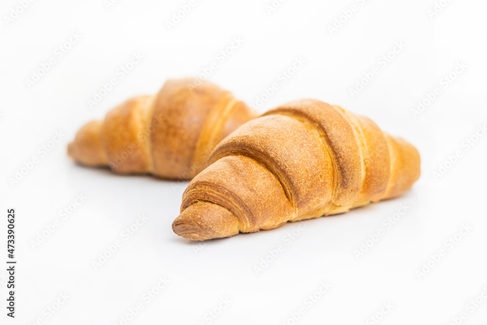 delicious sweet pastry croissant on white isolated background