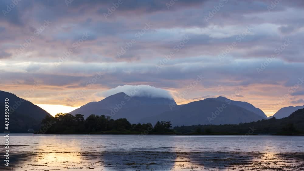 Time lapse of lake and clouds at sunset in the highlands in Scotland Time lapse of lake and clouds at sunset in the highlands in Scotland