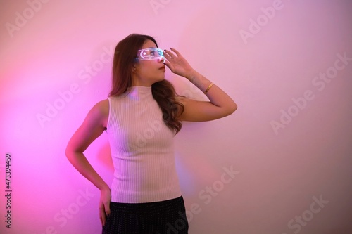 Asian woman with future digital glasses,future technology concept.