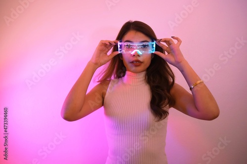 Asian woman with future digital glasses,future technology concept.