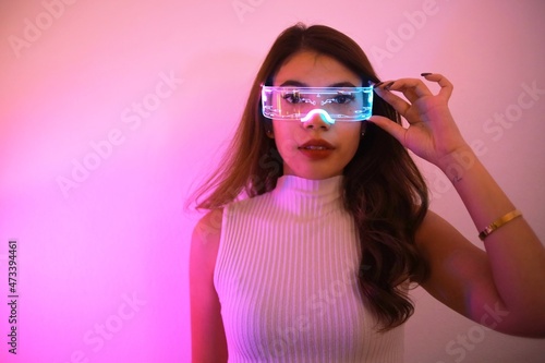 Asian woman with future digital glasses,future technology concept.