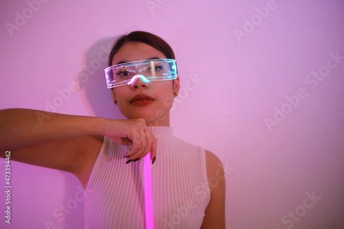 Asian woman with future digital glasses,future technology concept.