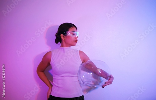 Asian woman with future digital glasses,future technology concept.